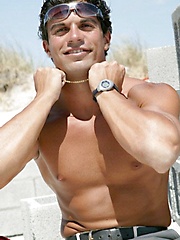Athletic latin dude posing outdoor