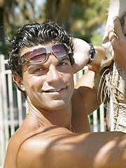 Athletic latin dude posing outdoor