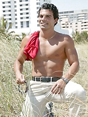 Athletic latin dude posing outdoor