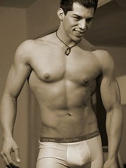 Muscled straight guy posing