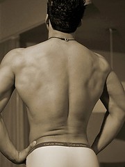 Muscled straight guy posing