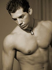 Muscled straight guy posing
