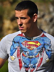 Beefy european jock showing his strong muscles