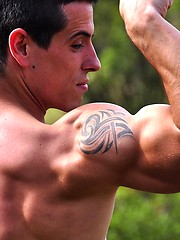 Beefy european jock showing his strong muscles