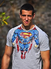 Beefy european jock showing his strong muscles
