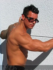 Jock poses outside and jerks off on bed