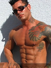 Jock poses outside and jerks off on bed