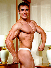 Handsome guy Axel Agabo showing his muscled body