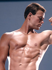 Muscled hunk in erotic session