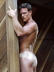 Muscled hunk shows his body and cock
