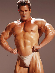 Muscle man poising naked