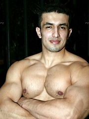 Muscled latin man posing