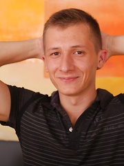 Martin Sanders kisses his bicep and cums on his stomach.