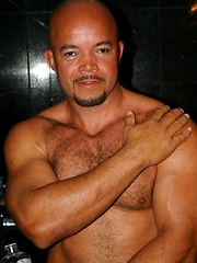 Bald daddy showing his muscled latin body