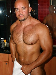 Bald daddy showing his muscled latin body