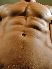Ripped stud Michael Davids plays with this uncut dick.
